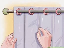 how to hang curtains in a bay window