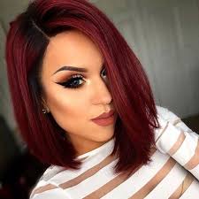 The eyes are of light shades: Rock Black Roots With Red Hair To Give It A More Eye Catchy Look Short Red Hair Hair Styles Dark Red Hair Color