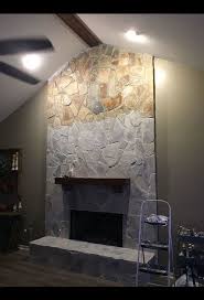 Whitewash Your Stone Fireplace For