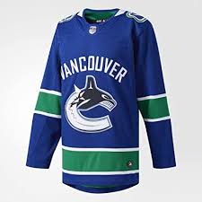 He's a hockey player that loves coming to the rink and playing. Amazon Com Adidas Vancouver Canucks Nhl Men S Climalite Authentic Team Hockey Jersey Clothing