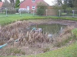 how to dredge a pond a definitive