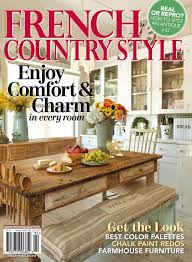 It features a wood stove inside the fireplace and the color scheme is soft muted colors with a rustic finish and an excellent shelving idea. French Country Style Magazine Digital Discountmags Com