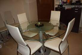 round glass dining table with in built