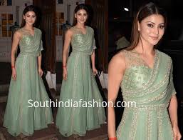 urvashi rautela in a mint green gown