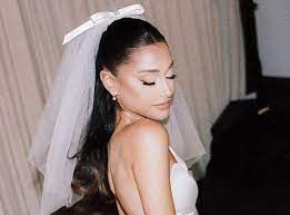 @photokohli ariana grande graced us with her gorgeous wedding photos on wednesday, may 26 — and while there's much to obsess over (read: Noxypbwvavt5lm