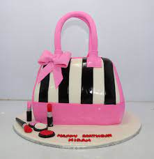 pink hand bag with makeup cake purse