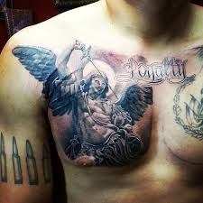 In this tattoo, the greek warrior can be seen holding a shield and a sword that symbolize protection, power, and strength. Fabulous Angel Warrior Tattoo Design On Men Chest Segerios Com