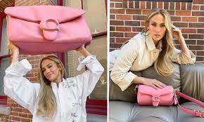 If you love them t. Jlo S Viral Tiktok Coach Bag Now Has Matching Pool Slides And We Re Obsessed Hello
