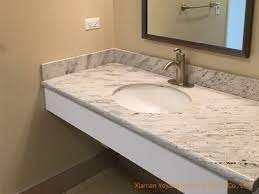 Marble, granite and other stone countertops require periodical maintenance to keep the water from ruining its finished look. China Polishing White Grey Black Brown River White Granite Stone For Kitchen Countertops Bathroom Vanity Manufactory China Kitchen Countertop White Granite