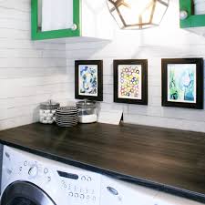 You can see the island from the old kitchen that has been repurposed for a laundry folding table. Diy Wood Plank Laundry Room Countertop Blue I Style