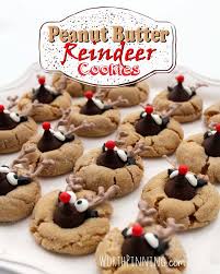 I make sugar cookies with a peppermint / candy cane. I Tossed A Bag Of Hershey S Kisses Into My Grocery Cart A Couple Of Weeks Ago Thinkin Cookies Recipes Christmas Peanut Butter Reindeer Cookies Holiday Desserts