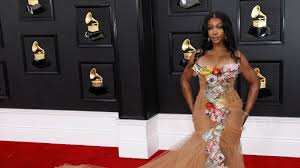 sza s sos holds off taylor swift for