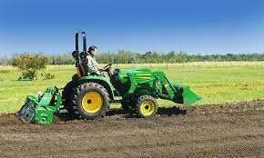 a tractor mount rotary tiller