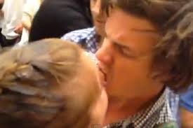 video woman bites off man s lip in