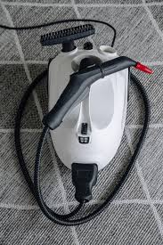 steam cleaner on the carpet top view