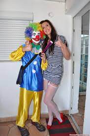 Kinky milf Lara Latex opens legs in white gartered stockings for a  well-hung clown