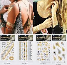 All of these armband tattoos are a what unique armband tattoo ideas will you find on this list? Grosshandel Temporare Tattoo Flash Metallic Schmuck Tattoos Armband Tattoos Madchen Schonheit Silber Gold Tattoos Halskette Feder Blume Herzform Tattoo Von Gift Wholesale 0 55 Auf De Dhgate Com Dhgate