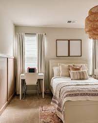 white bedroom with brown carpet soul