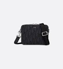 Men's bag for everyday use has one big compartment and one separate small pocket. Pouch With Shoulder Strap Black Dior Oblique Jacquard Leather Goods Man Dior
