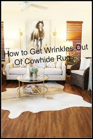 how to get wrinkles out of cowhide rugs