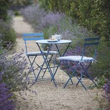 If you have a small nook to eat and entertain, a handy bistro table is one way to fit it all in. Small Bistro Set In Blue By The Forest Co Notonthehighstreet Com