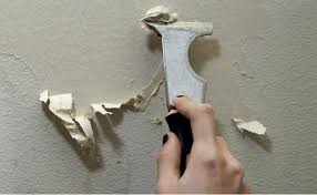 how to clean glue residue on the wall