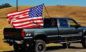 Image result for picture of us flag on truck