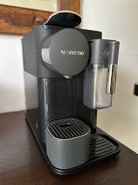 nespresso delonghi coffee machine tv