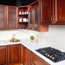 cherry cabinets and white countertops