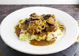 Sirloin steak is cooked stovetop and sliced, then served with browned mushrooms in a buttery balsamic sauce. Mushroom And Onion Smothered Cube Steak Easy Cube Steak