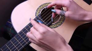 play acoustic guitar with long nails