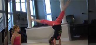 easy elbow stand in gymnastics