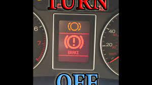 how to turn off brake pad warning light