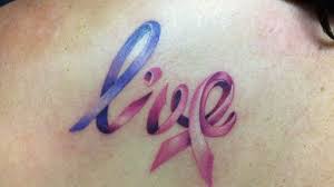 It also becomes the symbol of awareness of drunk driving which can bring danger black color becomes the common symbolization of mourning and this meaning can also be found from the black ribbon. Cancer Ribbon Tattoos Design Press Designs With Images