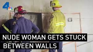 Firefighters Rescue Woman Trapped Between Walls | NBCLA - YouTube