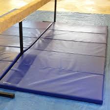 balance beam and a dismount mat