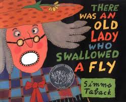 There Was an Old Lady Who Swallowed a Fly By Simms Taback | Used |  9780670869398 | World of Books