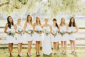 A shorter bridal design is often chosen for a more relaxed wedding such as a civil ceremony, beach or destination wedding. Short White Bridesmaid Dresses With Black Pumps Photo By Benj Haisch Wedding Inspiration Board Junebug Weddings