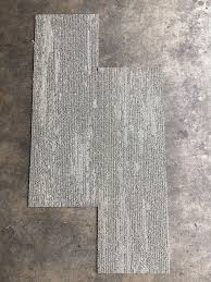 grey and brown carpet tile in
