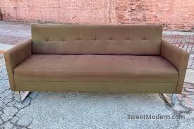 Tufted Sofa With Sled Style Chrome Base