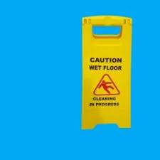 triangle yellow caution wet floor sign