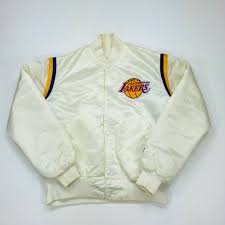 Really rare and a super nice starter jacket with pockets and a tuck in hoodie please message me before buying or with any questions Vintage Starter Los Angeles Lakers Satin Jacket Depop