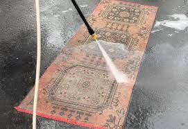 how to pressure wash a rug young