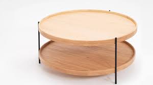 It has a smooth, brown laminate top and black metal, open frame legs. Sage Round Coffee Table Eq3 Contemporary Coffee Table