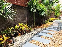 If you dread the idea of weeds or volunteer plants growing between spaces, pavers can be butted together for a smooth, unbroken surface. Side Garden Pebbles And Pavers Thai Garden Design
