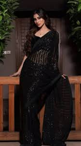 stunning beauty in black saree