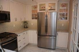 Consider resurfacing or repainting the kitchen cabinets instead of installing new ones. Kitchen Cabinets Rockville Md