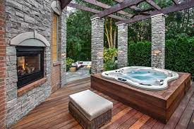 A Fireplace And A Spa Bathtub Is A