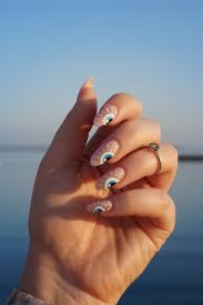 pink glitter evil eye nails manicure