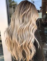 The line between the blonde and brunette is washed away by gentle caramel hues. Hair Color Blonde Highlights Beach Ombre 29 Ideas For 2019 Beach Blonde Hair Balayage Long Hair Blonde Hair Color